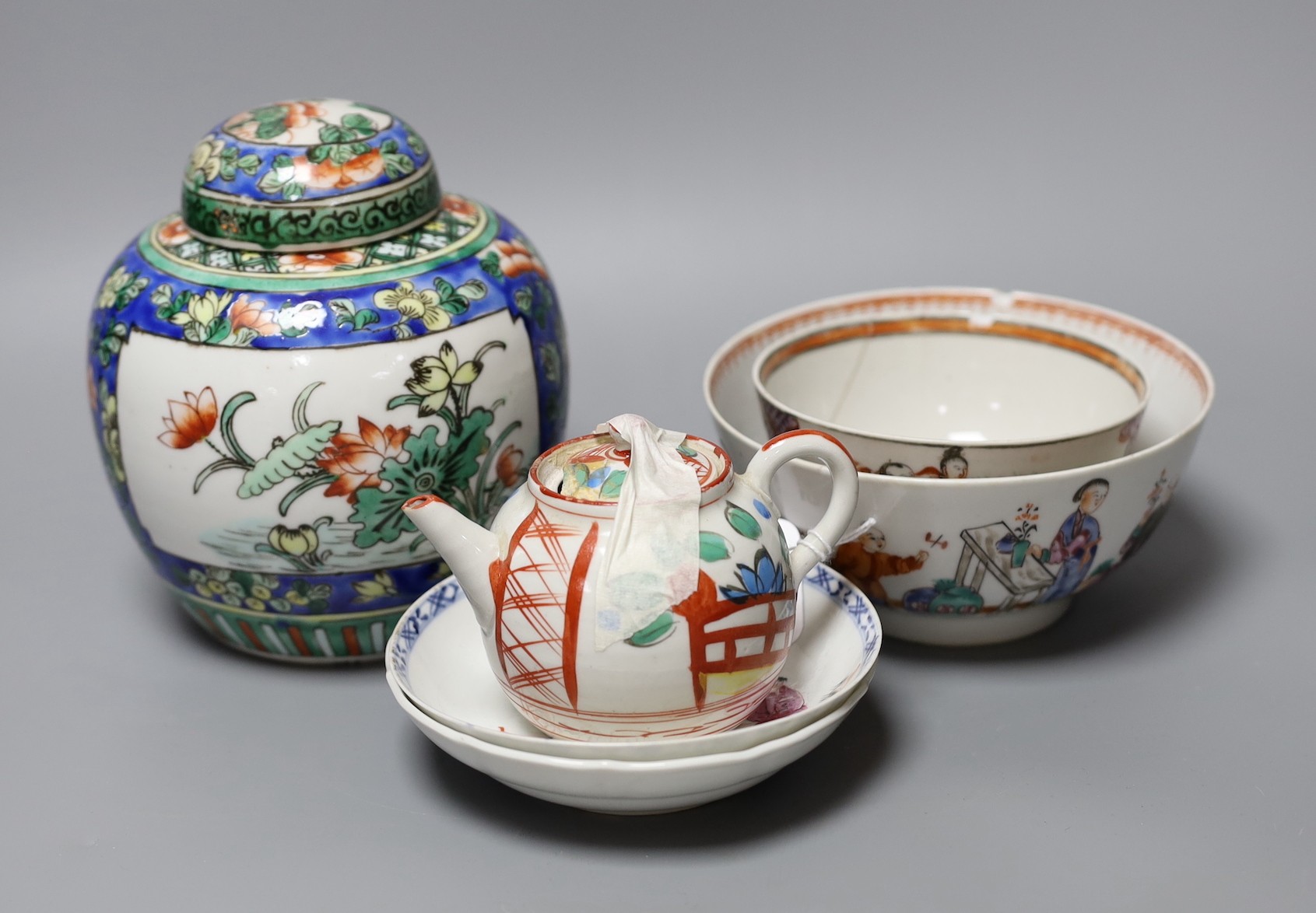 A Chinese ginger jar and cover, two tea bowls and a miniature teapot, tallest 16cm